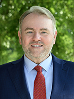 Headshot of SBM President Joseph P. McGill